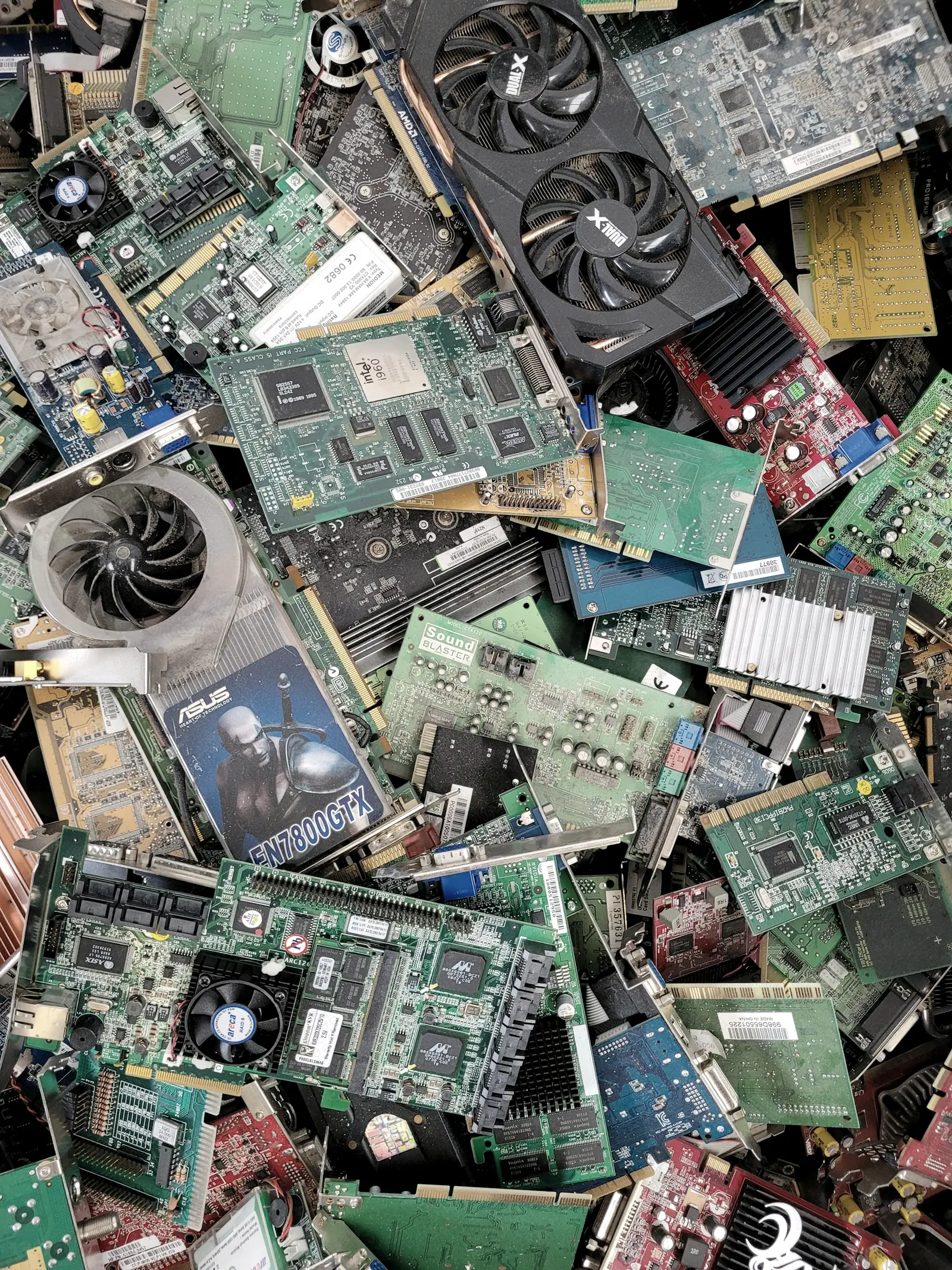 A pile of circuit boards separated for recycling