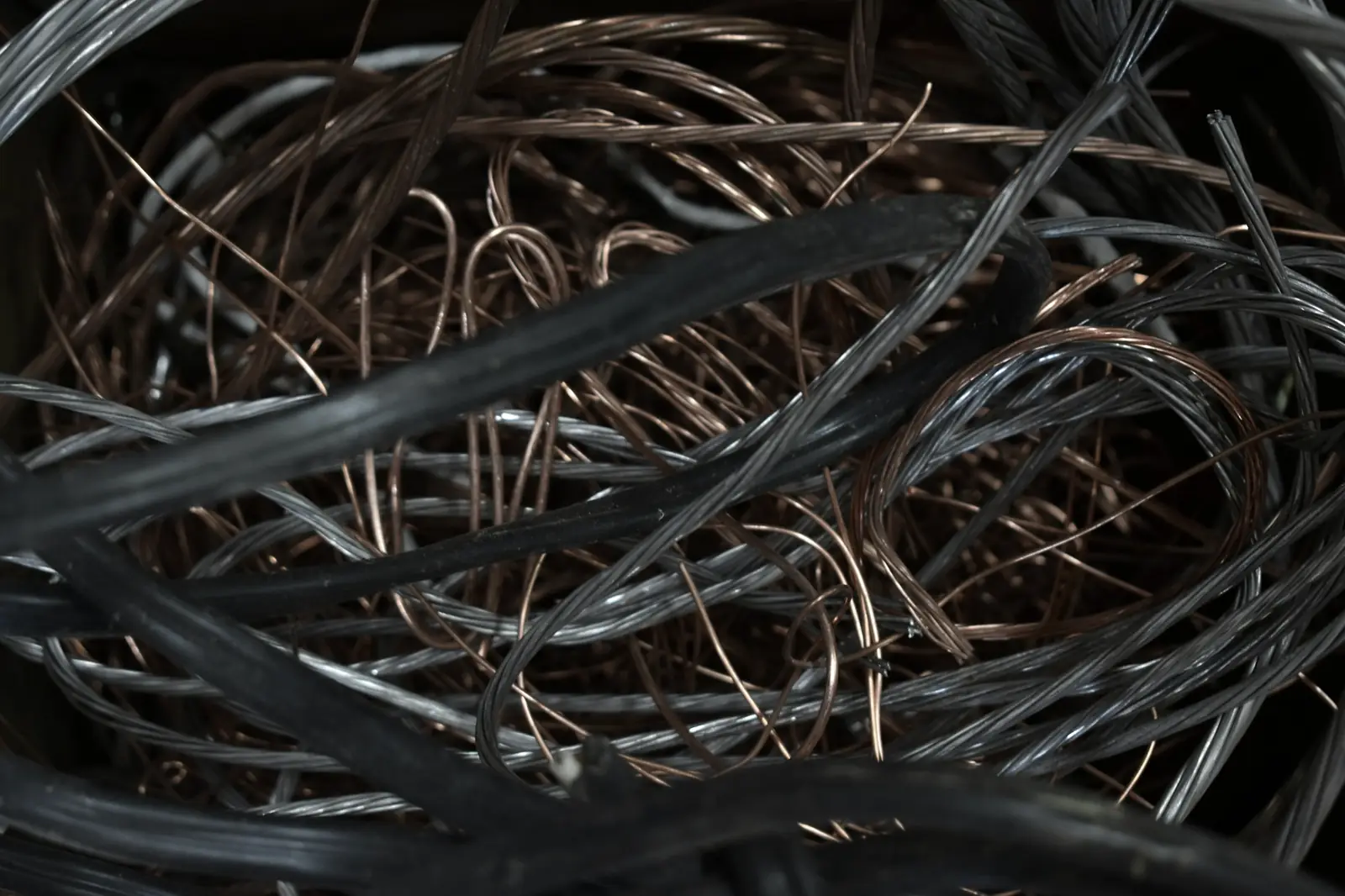 Loose stripped copper wire, tangled in a bin