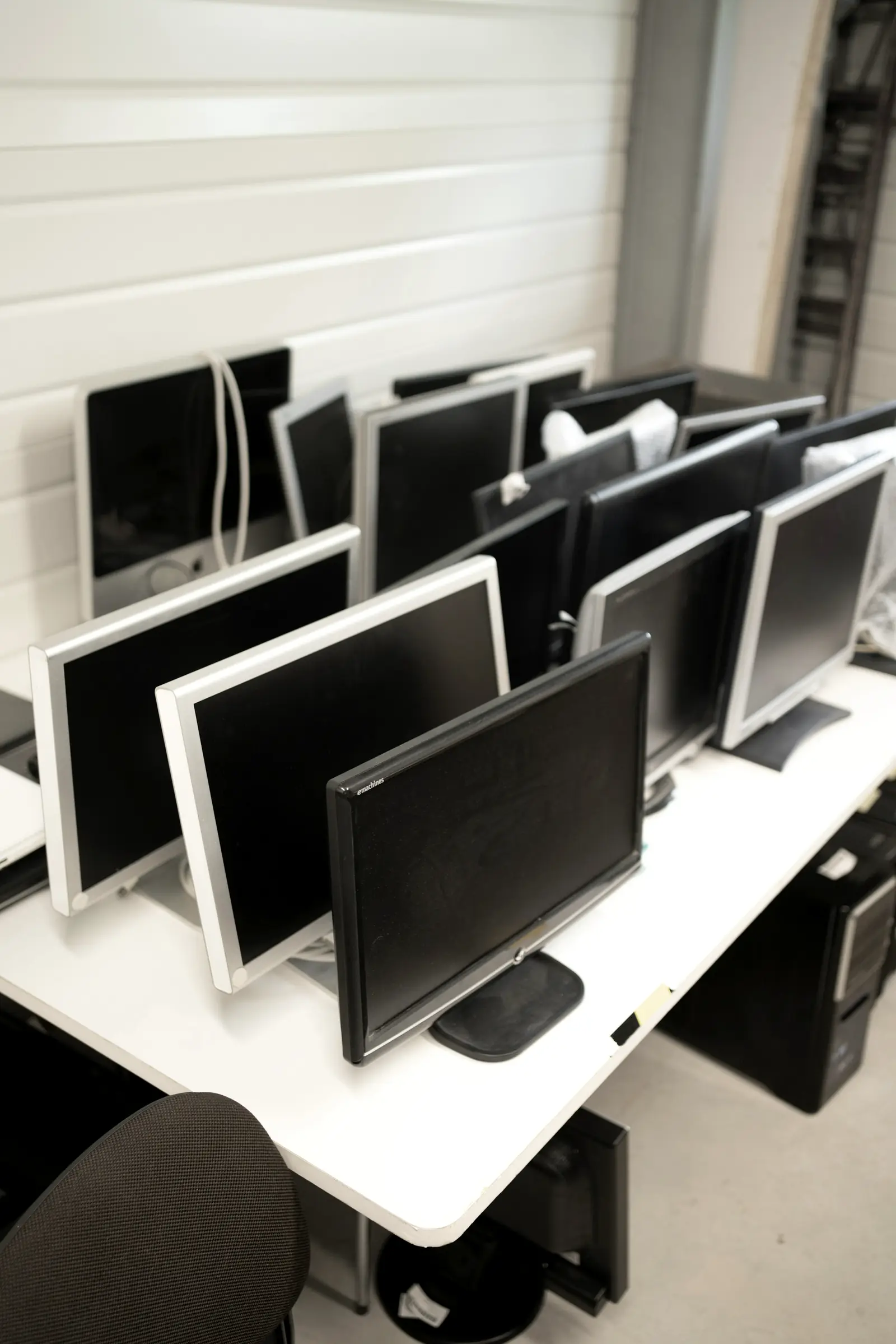 Rows of retired flat-panel monitors